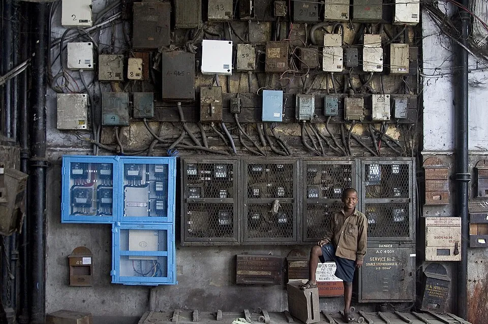 Row of electricity meters for separate portions of a building