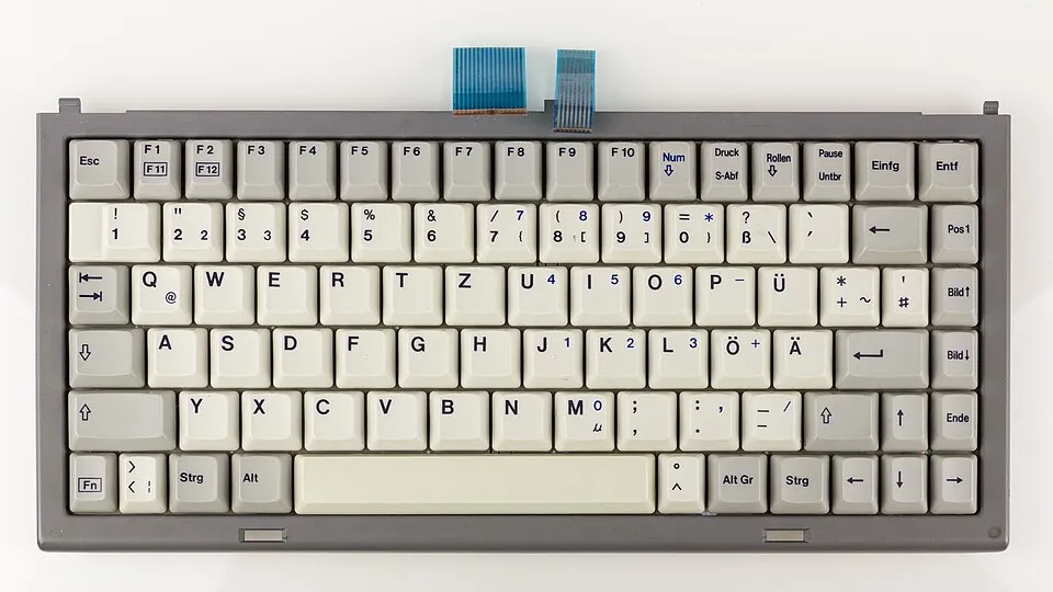 A laptop keyboard used to fill the online tenancy registration form