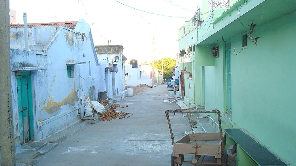 Row of houses along a narrow residential street in Aravakurichi, Tamil Nadu